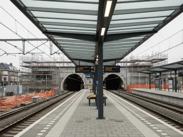 News image about realistic Amsterdam Zuid station infrastructure stock photo: modern railway platform and p