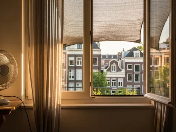 News image about realistic Amsterdam summer housing stock photo: small apartment window with light curtains