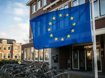 European Union flag outside a Dutch public office used to illustrate long term EU resident status