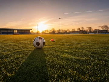 News image about realistic sports news stock photo with field texture, ball or training equipment, dramatic