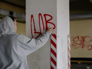 Anti-asylum graffiti Engelen on houses and vehicles