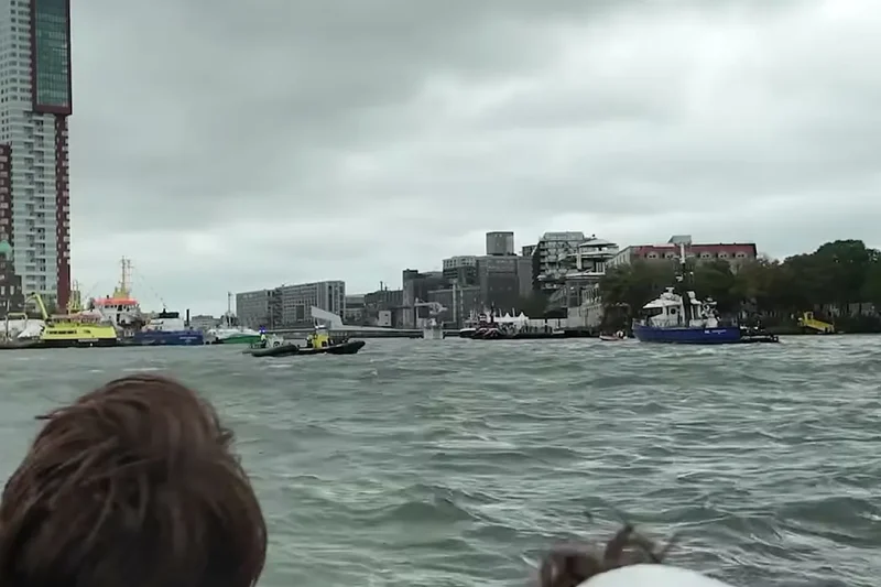 Visitors on a navy boat on the Maas during the Wereldhavendagen in Rotterdam