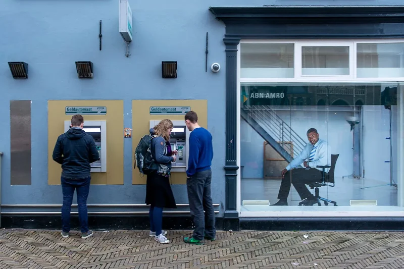 Cash machine keypad and withdrawal slot, illustrating the Dutch trial of 100-euro banknotes